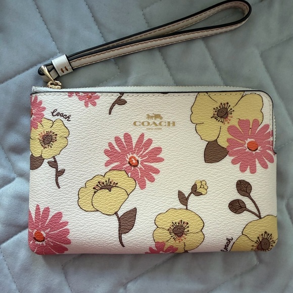 Coach Handbags - NWT Coach Floral Wristlet - Cream and Pink